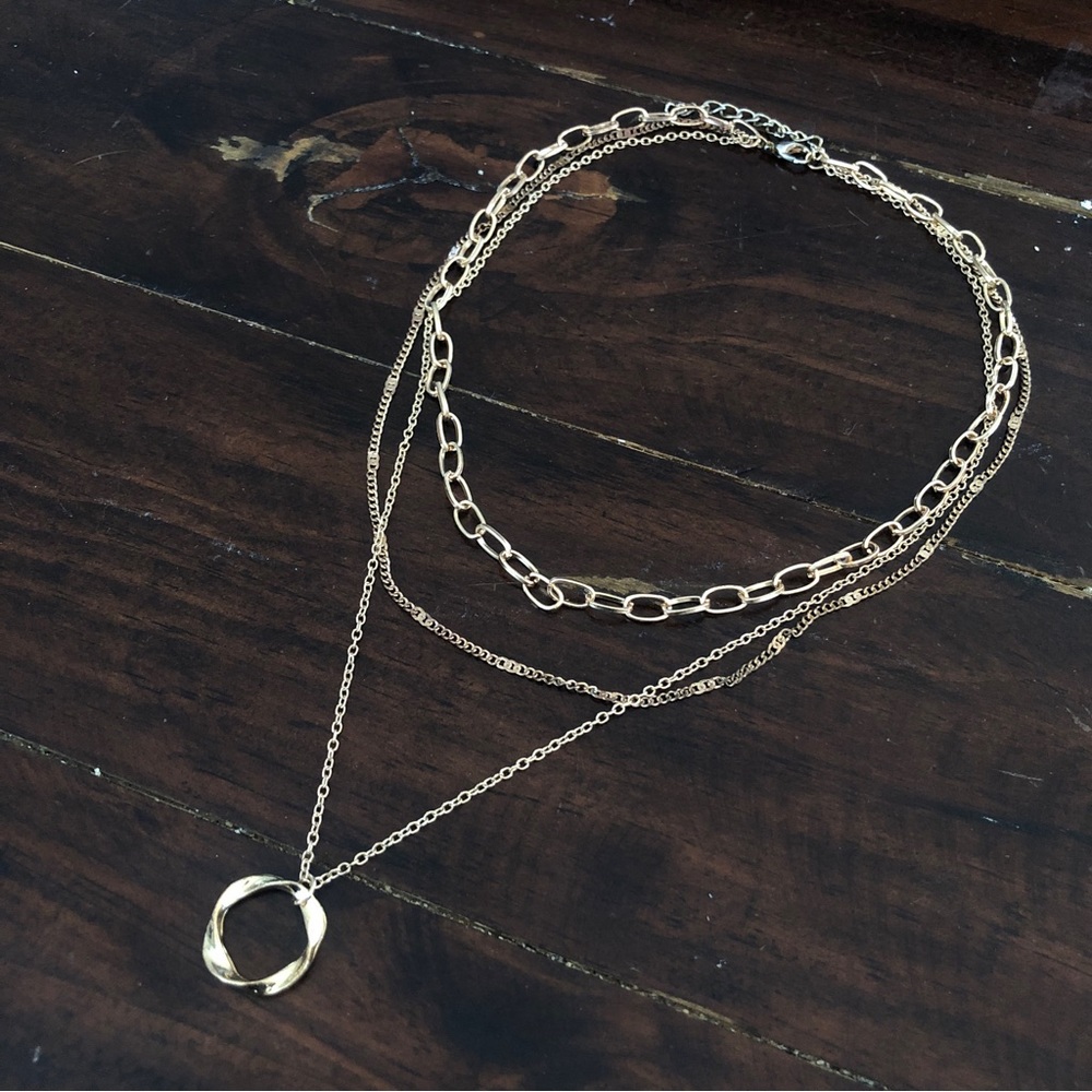 Adjustable gold colored necklace